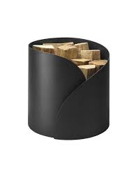 Porte Buches Decouvrez Notre Selection De Porte Buches Elle Decoration Porte Buche Panier A Buche Porte Buche Design