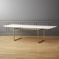 Shop Carmen White Wood Dining Table White Painted Mango Wood Stretches Long And Lean Atop Minima Mango Wood Dining Table Wood Dining Table Dining Table Gold