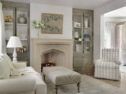 Wood grey kitchen images cabinets on either side of mantel. Gray Gingham Roll Arm Chair With Limestone Fireplace Mantel French Living Room