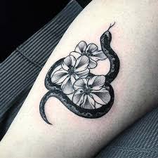 Tropical and hawaiian flower tattoos can be seen on its own; 43 Bold And Badass Snake Tattoo Ideas For Women Page 2 Of 4 Stayglam