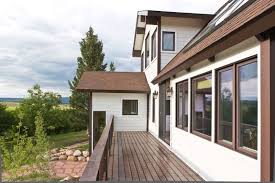 The thickness of wood sheathing counts toward the total thickness that the fasteners must penetrate into nailable material. Kansas City Vinyl Siding Vinyl Home Siding Kc Alenco
