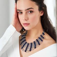 Conjunto de collar y pulsera de cuentas de arena morada hechos a mano