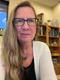 Kathy Hellman, director of beloved library, sees everyone as a work in  progress