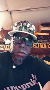 Fr Spelman with his family as a young priest at Holy Rosary