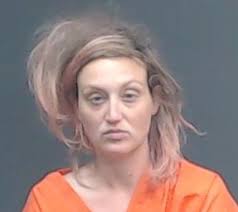 The employees at Walgreens Pharmacy got a big surprise when they got to  work this morning. As they were about to unlock the front door, they  noticed a woman in a robe