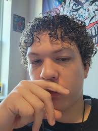 hey ladies my son has these beautiful curls and I want to know what  products are good to keep his curls nice and bouncy and Define right now in  both pictures he