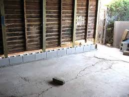 Adding Blocks To The Bottom Of Wood Walls Building A Garage Cinder Block Foundation Wood Fence