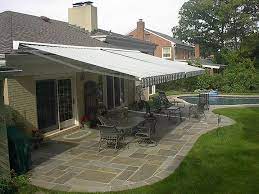 Comparing The Patio Awning Patio Awning Two Retractable Awnings Side By Side Over A Stone Patio With Ocxuunr Patio Retractable Awning House Awnings