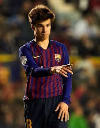 Ricard riqui puig martí is a spanish professional footballer who plays for barcelona as a central midfielder. Riqui Puig