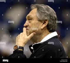 Apr 02, 2004; San Antonio, TX, USA; NATE HANCOCK (L) tries to get his son,  WILLIAM, to clap as his William's grandfather, BILL, holds him Friday,  April 2, 2004 at the Alamodome.