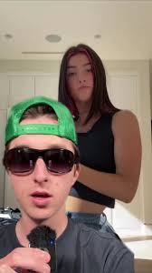 Charli D'Amelio's Stunning Style in Clear White Dress