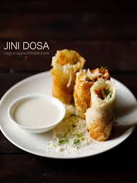 Jini Dosa Recipe A Yummy Crispy Cheesy Dosa With Spicy Sour Sweet Taste Along With The Crunchiness Of The Food Indian Food Recipes Vegetarian Street Food