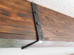 The following is a quick tutorial of. Wood Ceiling Beam Straps Leah And Joe Home Diy Projects Crafts Wood Beam Ceiling Faux Ceiling Beams Reclaimed Wood Ceiling