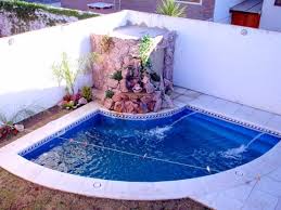 This smaller backyard concept features the best of both worlds. 10 Pools Perfect For Small Yards Homify