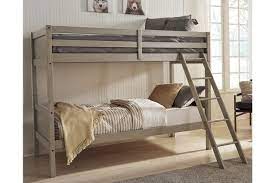 And a set of steps to climb into the bed. Lettner Twin Twin Bunk Bed With Ladder Ashley Furniture Homestore