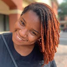 Copper locs by colorist Simone Baker. Call today for your consultation and  appointment. #copperlocs #coloredlocs #tavaresnaturals  #tavaresnaturalhairstylist @ Cherry Blossoms Salon and Spa