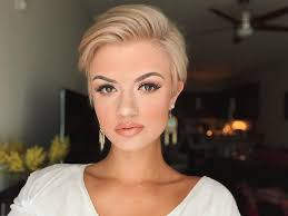 Image may contain: one or more people, flower, closeup and indoor