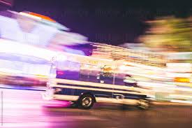 Listen to a traditional song for children about a very busy bus. Ambulance At Night By Good Vibrations Images Stocksy United