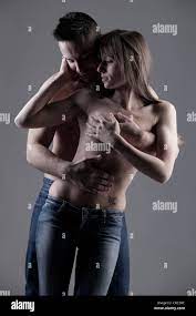 Nude couple hugging Stock Photo - Alamy