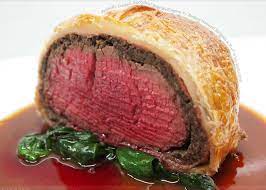 Beef Wellington With Buttery Sauteed Spinach And Port Wine Reduction Beef Wellington Beef Dishes Beef Recipes