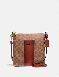 These beautifully designed coach handbag are available at marvelous discounts. Kitt Messenger Crossbody In Colorblock Signature Canvas Coach