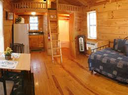 Our quintessential red cabin is a two bedroom, one bath cabin built high up on a mountain ridge with views extending far off towards the smoky blue mountains and the blue ridge parkway. Camping Cabins Lodging Rentals In Brevard Nc The Adventure Village