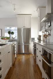 Sprinkle on color use this designer tip to add some visual spice to a kitchen filled with neutral countertops and cabinets: Kitchens Grey Paint Color Design Ideas