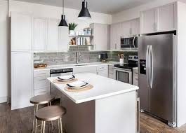 U shaped kitchen with a peninsula can be a perfect choice if you have a reasonably substantial space to work. Small L Shaped Kitchen With Island Glass Backsplash Quartz Countertops Small Kitchen Design Layout Simple Kitchen Design Kitchen Design Small