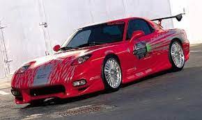 Mazda Rx 7 Among The Favorites From The Movie Was The 1993 Mazda Rx 7 That Dominic Toretto Drove In The Street Racing S Cars Movie Mazda Rx7 Fast And Furious