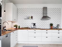 Black And White Kitchen With Wood Countertops Metro White Tile Kitchen Inspiration Wood Countertop Kitchen Tiles Design White Subway Tile Kitchen White Kitchen Backsplash