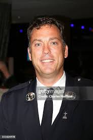 Irene Dickey, Jim Gray, and Christine Gray attend Tuesday's Children...  News Photo