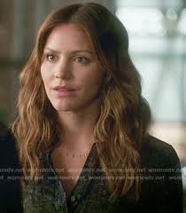 WornOnTV: Paige's dark green printed blouse