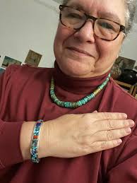 My new necklace created by my taino brother Ciba Bo Dgon . Maketaurie Guava  Replica of the cemi of Maquetauri in the form of a fang is made in Jaspe  Picasso from