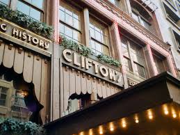 Image result for hotel being rebuilt with sign that says there was a spider