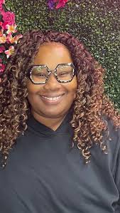 curly crochet braids with soft ombré blend installed to perfection