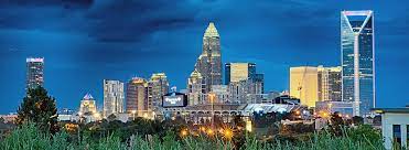 Charlotte is the largest city in the state of north carolina and one of the largest cities overall in the southeast united states. Charlotte City Skyline In The Evening Photograph By Alex Grichenko