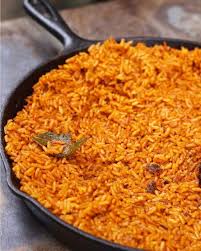 How To Make Jollof Rice In 5 Easy Steps Ev S Eats African Cooking African Food Jollof Rice