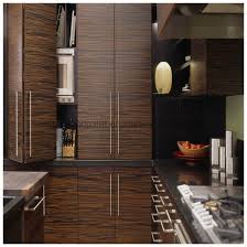 Sparkling white surfaces offset the striking bookmatched grain of macassar ebony, resulting in an imaginative and inspiring open plan kitchen/dining room. China Macassar Ebony Veneer Decorative Reconstituted Wood Veneers For Furniture Plywood Hpl Door Skin China Engineered Veneer Reconstituted Veneer