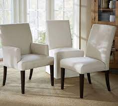 Diners and lunch that last hours won't be a problem anymore ! Pb Comfort Square Upholstered Dining Armchair Pottery Barn