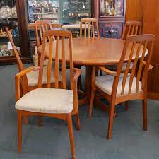 Mid century modern danish rosewood and inset tile top extendable dining table, two leaves, solid and well built. Designer Danish Modern Dining Room Chairs Oliver S Twist Estate Sales