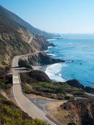The Pacific Coast Highway Winding Along The California Coast South Of Big Sur Pacific Coast Highway Road Trip California Coast California Travel