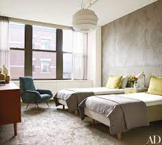 The interior designing of the twin bedroom is much more astonishing than the style of the beds. How To Decorate With Two Twin Beds Guest Room And Kids Bedroom Ideas Architectural Digest