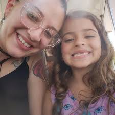 Hi all! I just wanted to introduce myself and share a photo that I took.  This is my daughter and as you can see by her water bottle