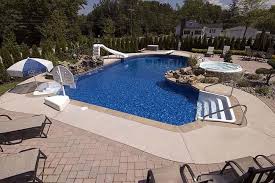 L Shaped With Slide Spa And Sitting Area With Umbrella In Ground Pools Pool Houses Pool Patio