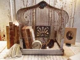 And repurposing birdcages as containers for plants and flowers is one of the simplest ways to use them in the home/garden. Decorating With Birdcages 12 Creative Ideas For Everyday Use Tidbits Twine Bird Cage Decor Antique Bird Cages Vintage Bird Cage