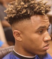 With a low fade hair disappears about an inch above the lines of hair growth, while a regular fade is something in between. Fade Haircut Guide 5 Types Of Fade Cuts Curly Hairstyles For Men