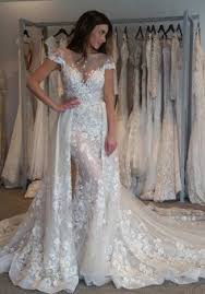 The back is highlighted with the trim of the zipper up style. A Line Bateau Cap Sleeves Sweep Train Boho Wedding Dress With Lace Wisebridal Com
