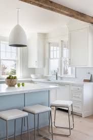 Hodedah kitchen island the hodedah kitchen island is a stylish yet functional addition to any home. Light Blue Center Island With Sleek Bar Stools Transitional Kitchen