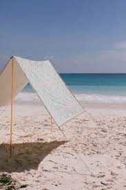 This Diy Beach Tent Fits In A Suitcase Ruffled Diy Beach Tent Beach Shade Beach Tent