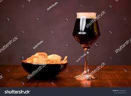 Glass Of Dark Beer With Chips On The Counter Table In Bar Alcohol Drink Food Photography Concept Copy Space Sponsored In 2020 Dark Beer Glass Alcoholic Drinks